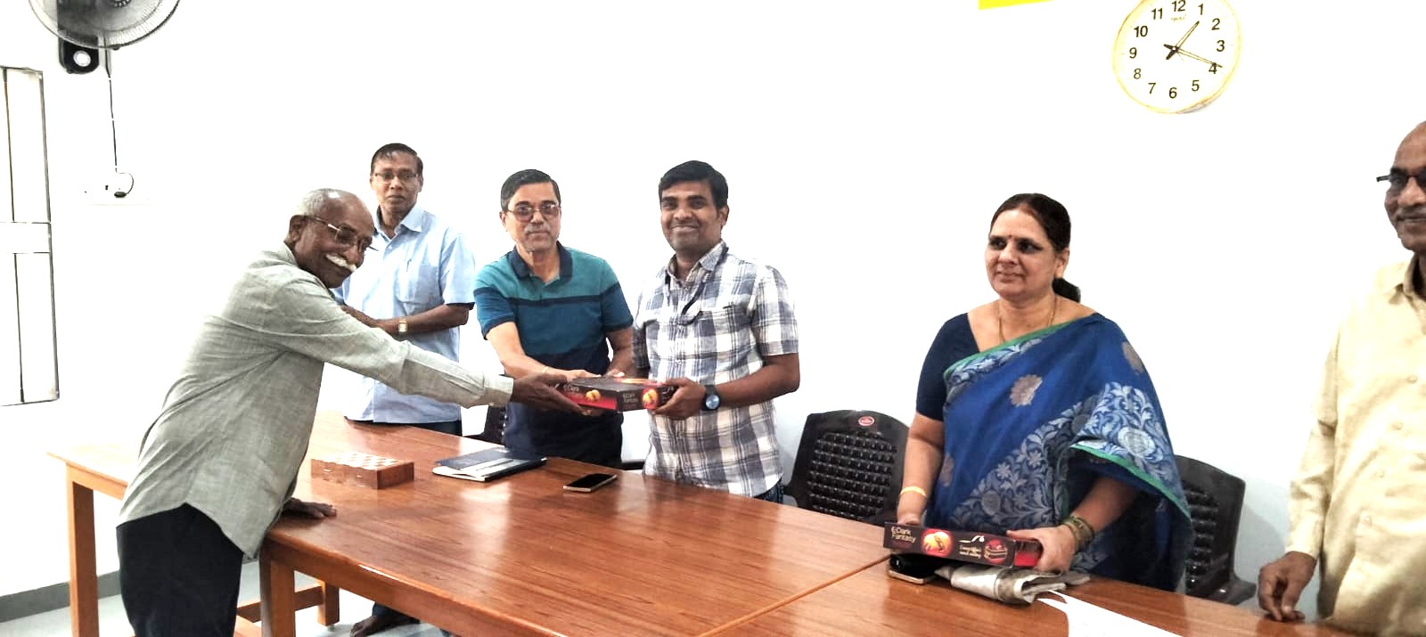 16 Treasurer and Joint secretary felicitating Sreekanth .jpeg width=